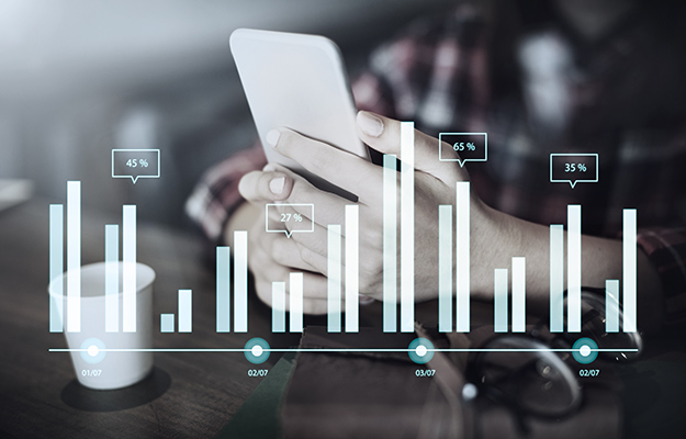 using phone with graph graphic on top | How to Improve Online and Offline Performance With Locl | Improve Personalization with Data Insights