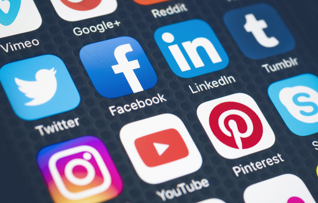 Phone screen showing multiple social media platforms | 5 Benefits That Locl Can Bring Your Business